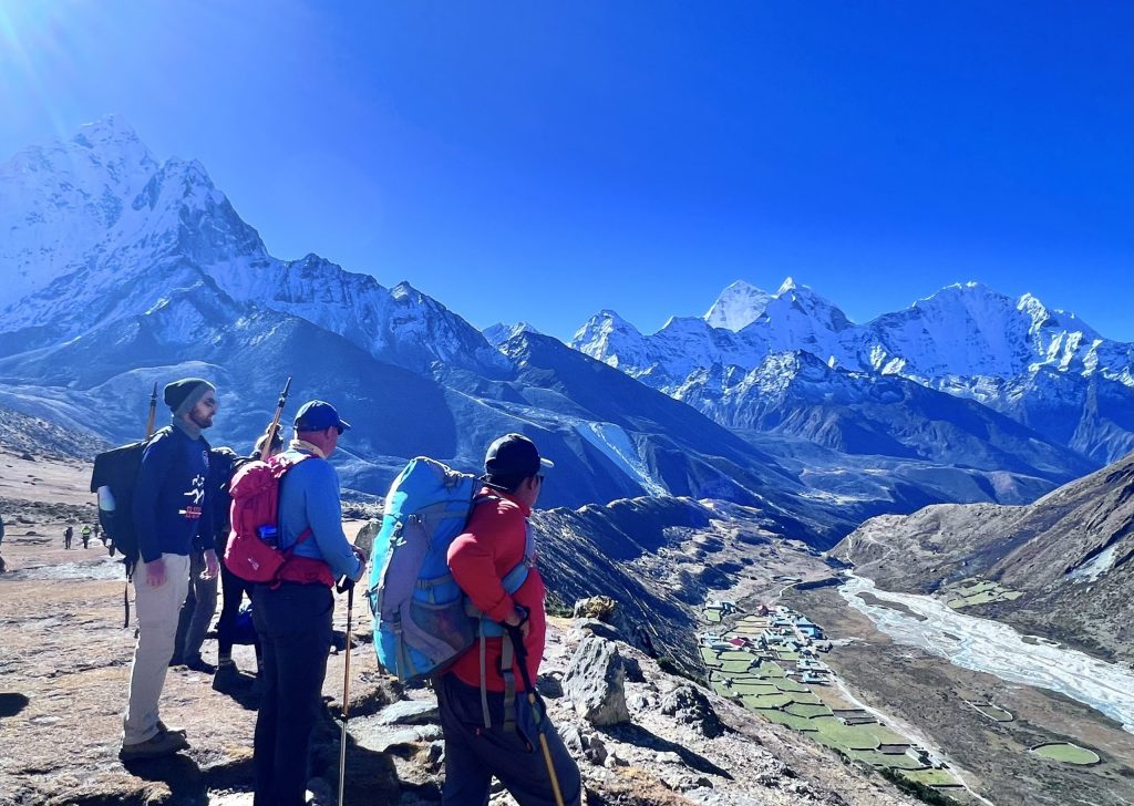 Trekkers Alongside Lhasso Guides