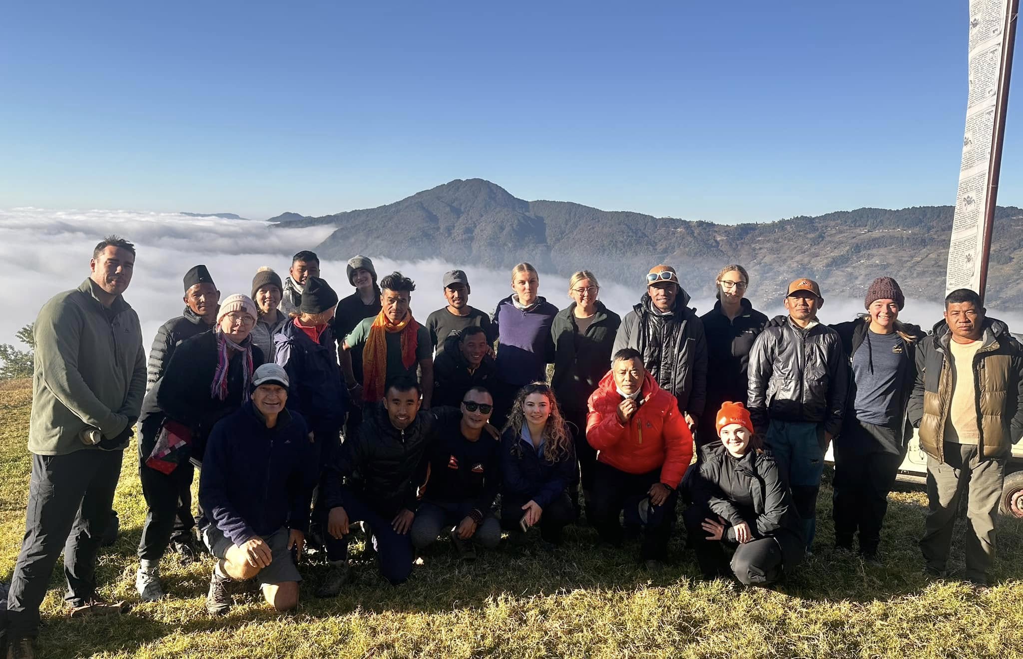 a quick photo session with lhasso's team and the trekkers at the last of helambu trek at Camp site (sermanthang)