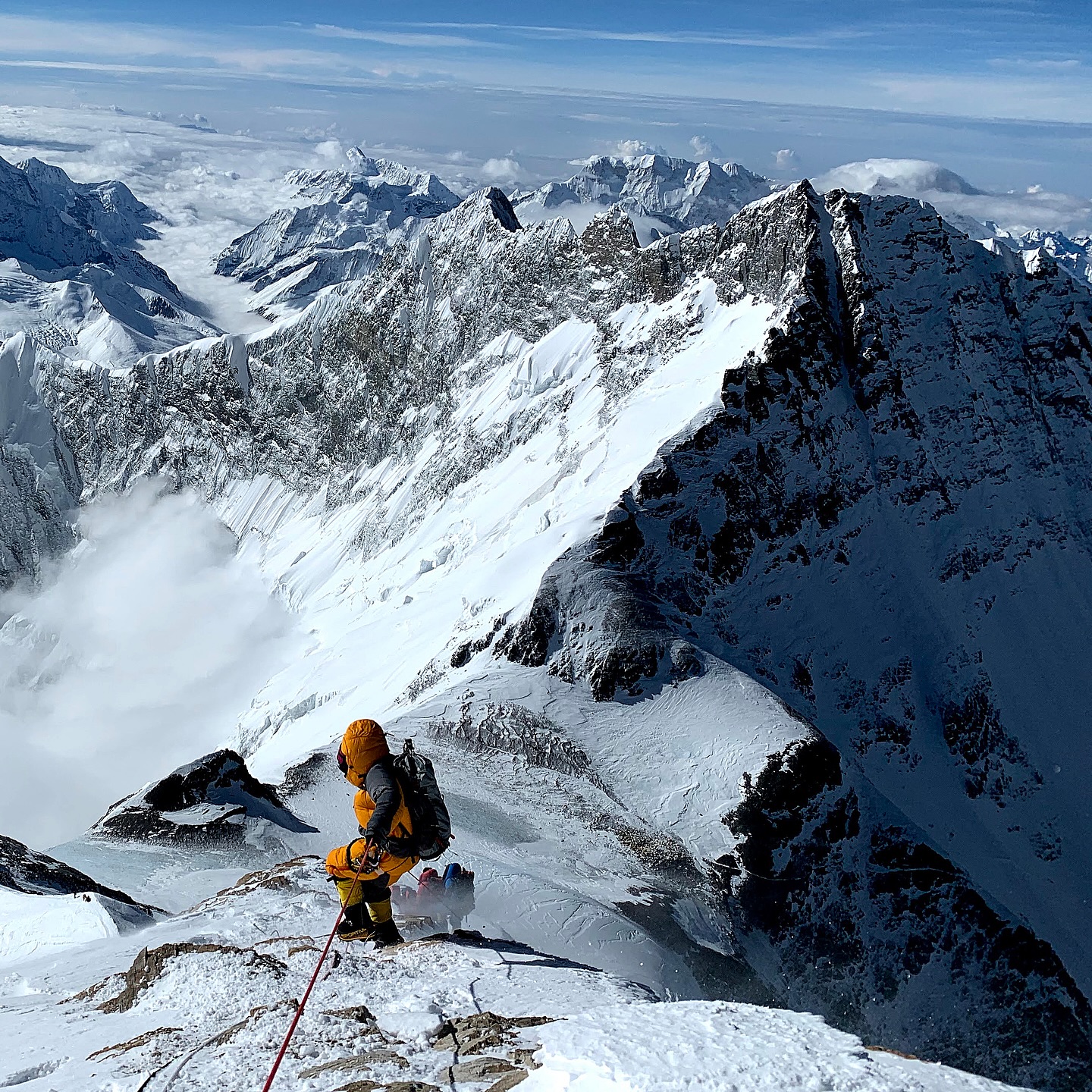View from high on Mount Everest showing the Himalayan range at sunrise while decending after summiting Mount Everest 