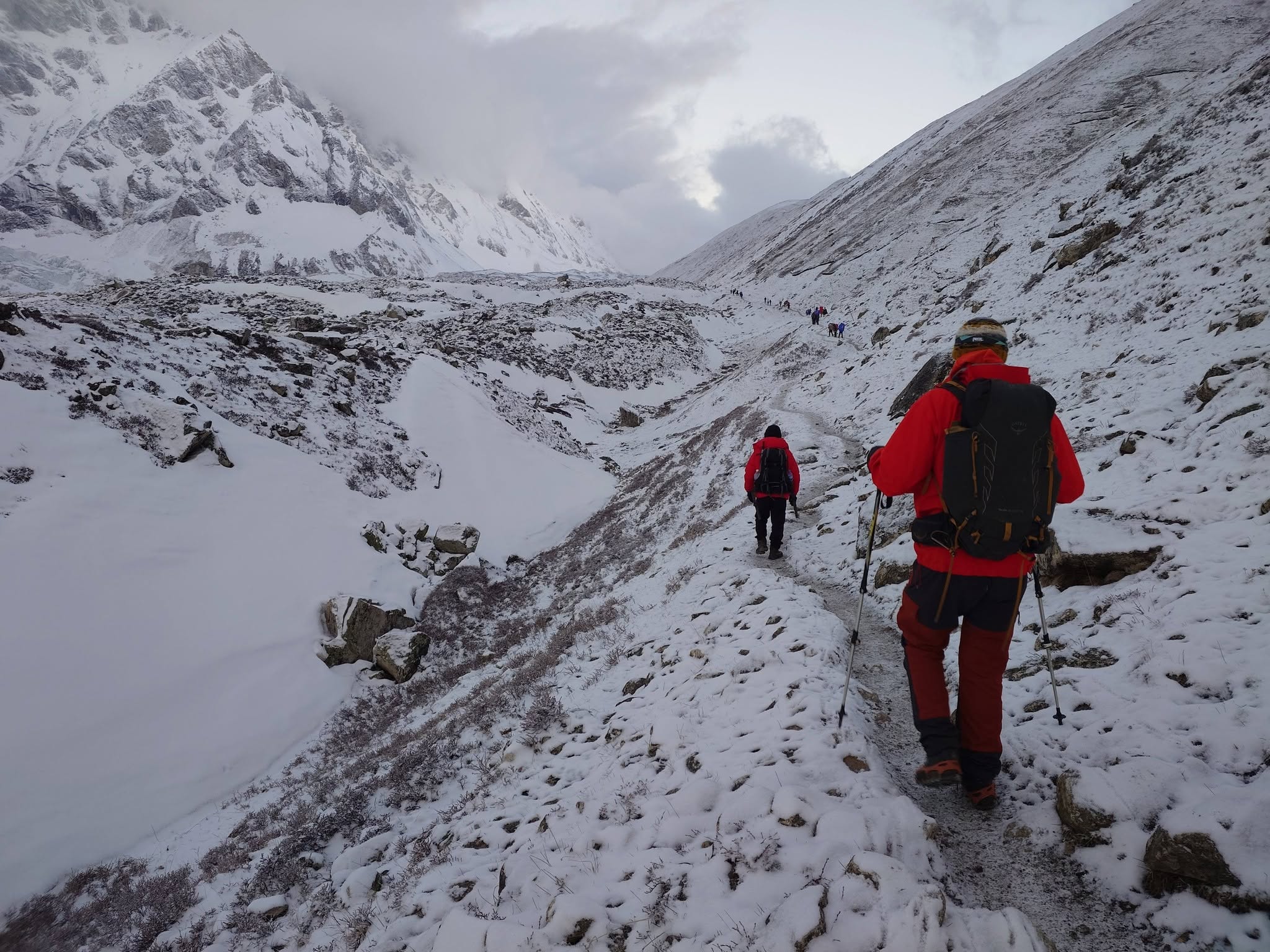 Snow-covered trail approaching Larkya La Pass at Manaslu Circuit Trek