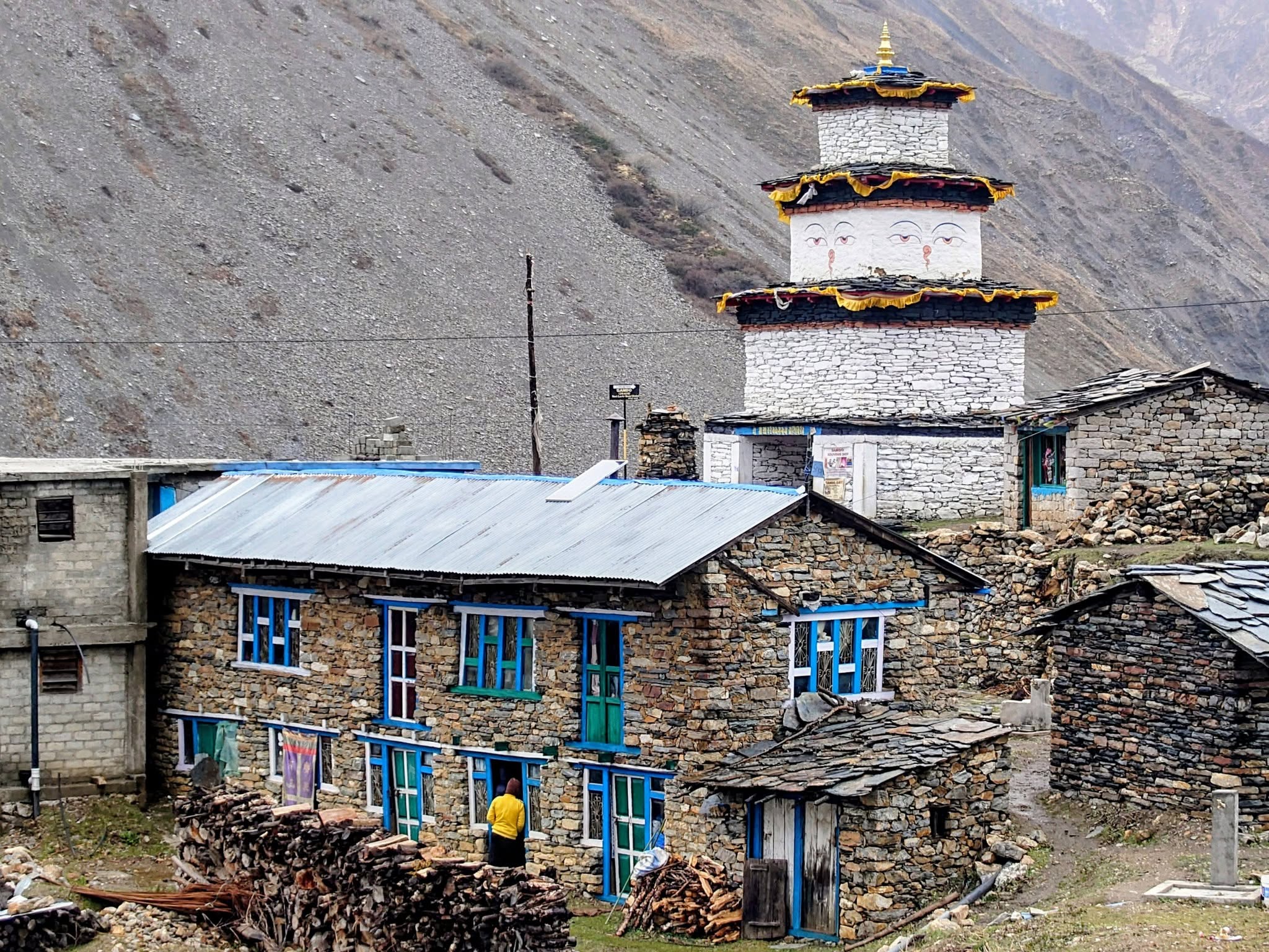 Teahouse dining area with trekkers in Manaslu region