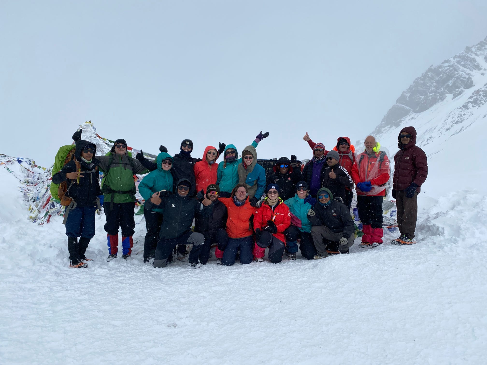 Thorong-La-Pass-summit-with-senior-guide-chandra-at-annapurna-circuit-trek